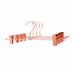 Percha Oro Rosado Con Broches Para Polleras y Pantalones 