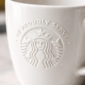 Taza Blanca Cerámica Starbucks frase "We Proudly Serve"